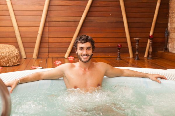 A person taking a ice bath-Science-Backed Benefits of Ice Bath Why Everyone's Taking the Cold Plunge A person taking a ice bath-Science-Backed Benefits of Ice Bath Why Everyone's Taking the Cold Plunge